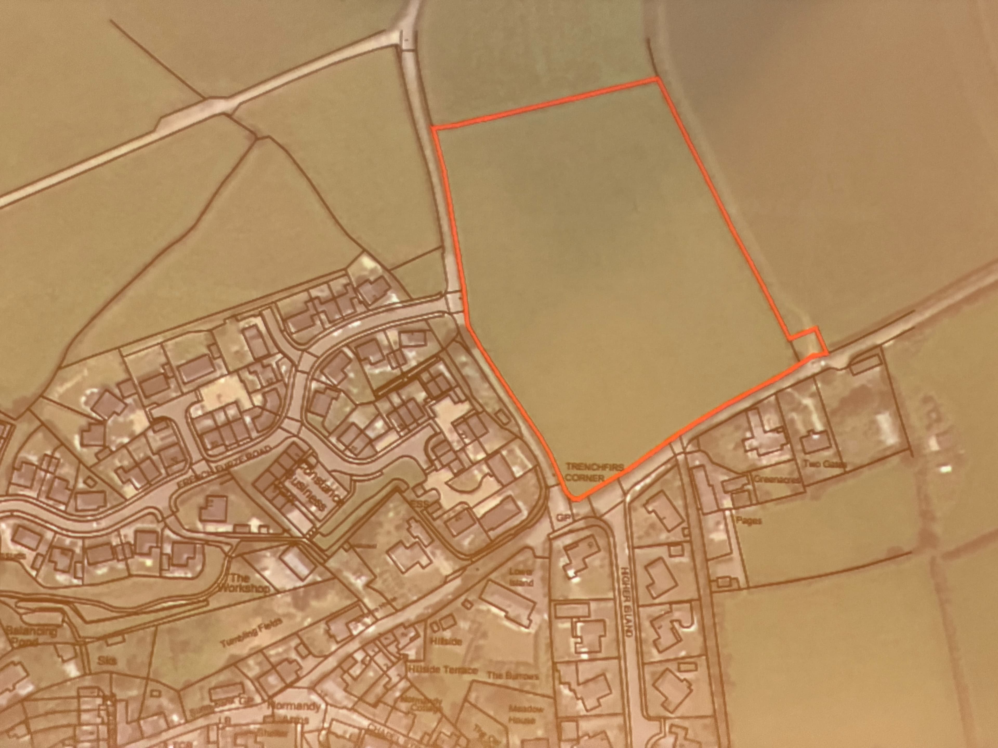 Photographed location plan: the red outline lies across the road from the French Furze entrance, near Trenchfirs Corner.